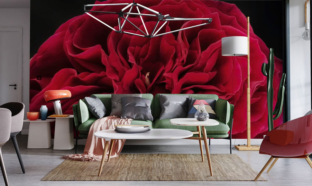 Luxurious deep red floral bloom wallpaper with elegant petal detailing, modern green sofa, light flooring.