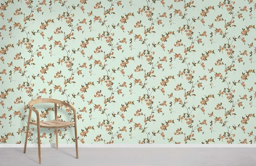 Vintage floral wallpaper in mint green, coral blossom pattern with wooden chair on grey flooring.