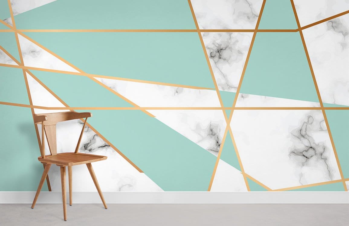 Mint green and gold geometric wallpaper with marble effect in modern room, wooden chair detail.