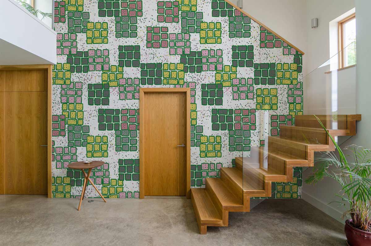 Retro Mosaic Pattern Wallpaper featuring green, yellow, pink squares; modern staircase, wooden doors. Room decor.