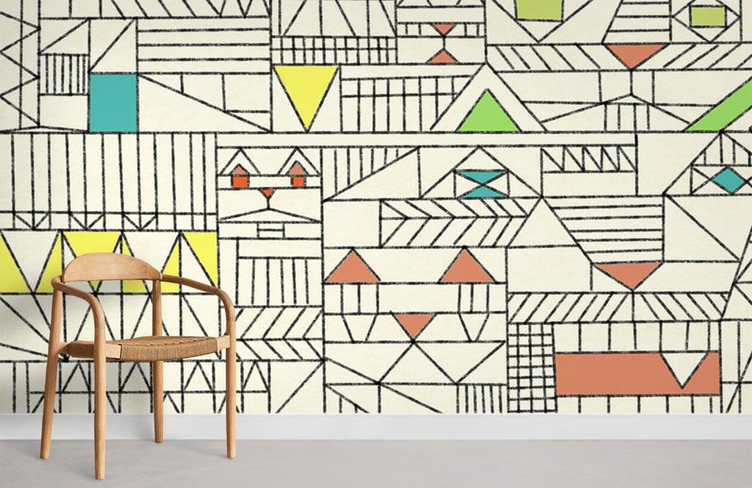 Geometric Retro Pastel Pattern Wallpaper on cream wall with wooden chair in modern room setting.