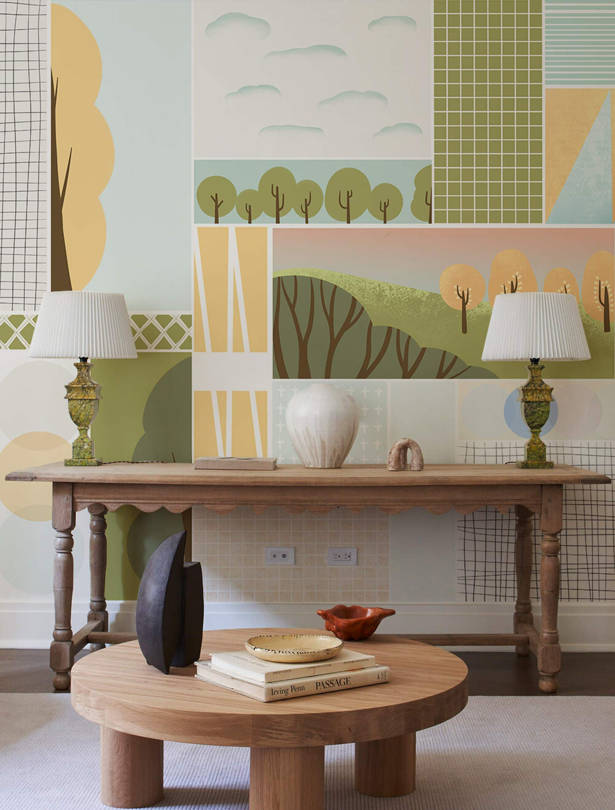 Pastel geometric forest mural wallpaper in eco-friendly decor, wooden table, round coffee table, lamps.