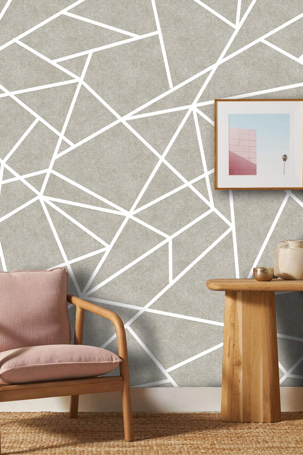 Modern geometric grey and white wallpaper, wooden chair, natural wood table, beige decor in lounge.
