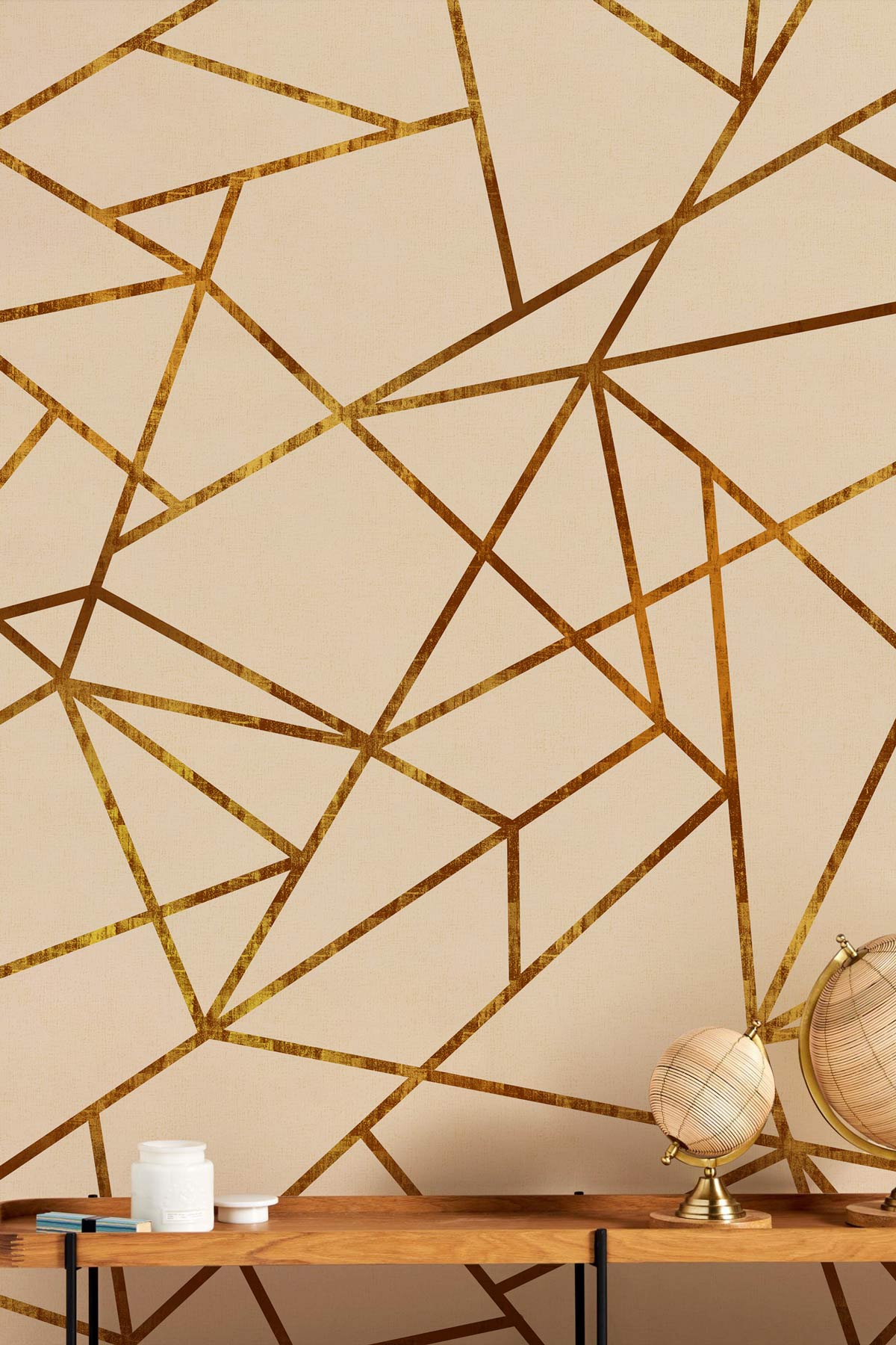 Contemporary gold geometric lines wallpaper, elegant modern interior design with wooden tabletop and globes.