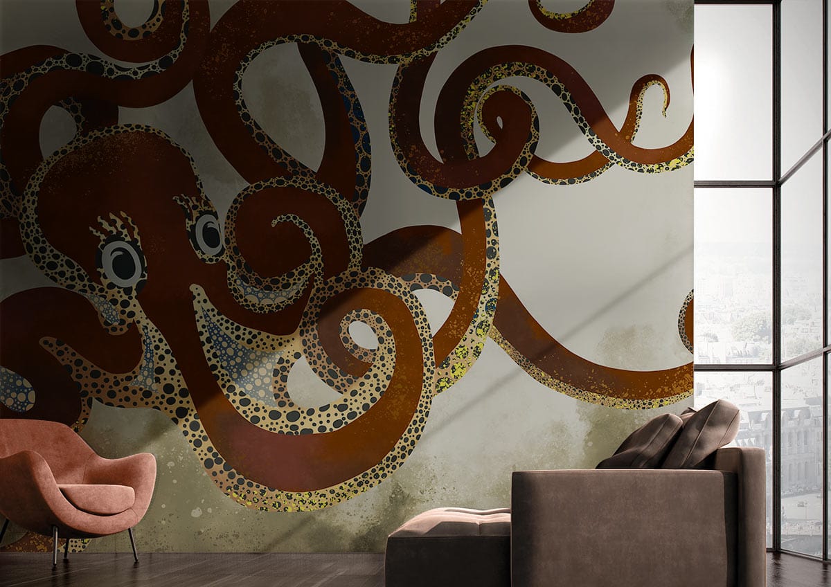 Vintage nautical octopus mural in modern living room with brown sofa, pink chair, and wooden flooring.