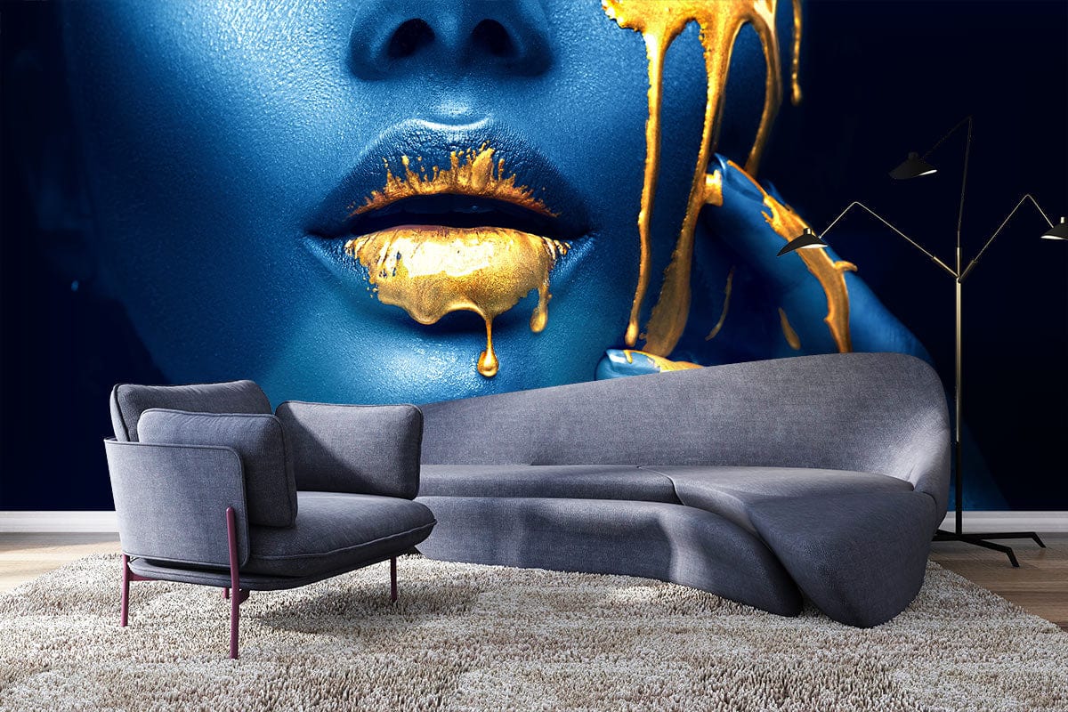 Elegant blue and gold drip art mural wallpaper, grey sofa, cosy rug, and modern floor lamp.