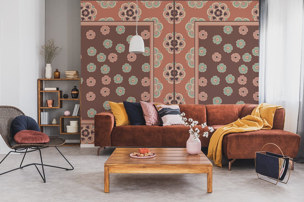 Retro floral wallpaper, peach and aqua, brown sofa, mid-century living room, wood table, pendant light.