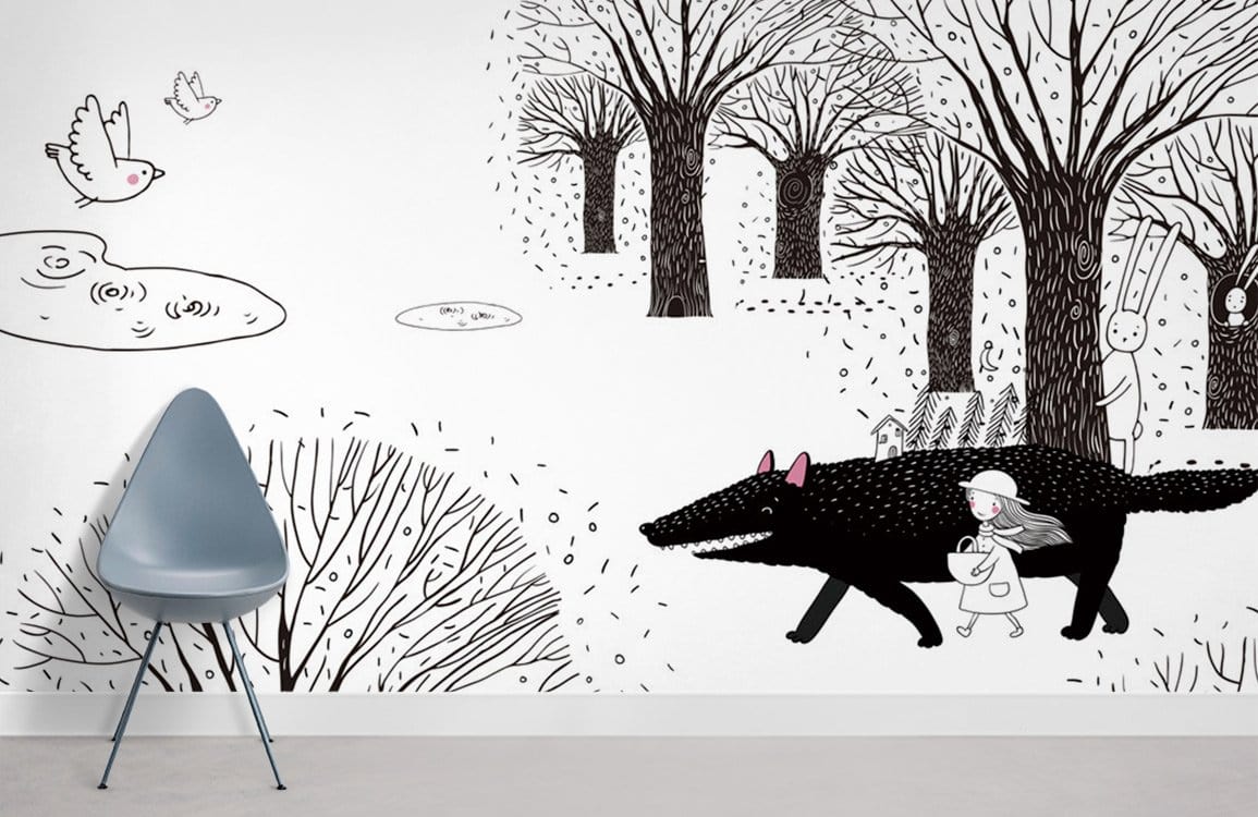 Enchanted Forest adventure mural wallpaper in children's room with modern chair, grey flooring, whimsical design.