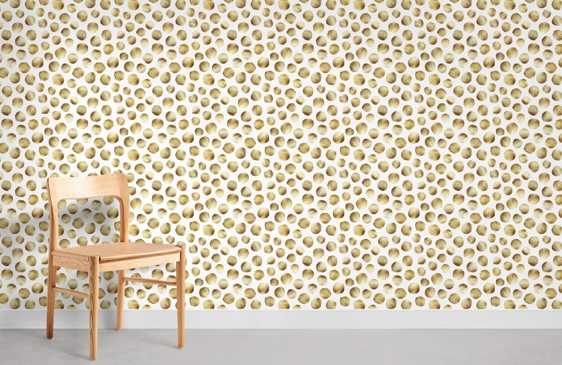 Golden honeycomb patterned wallpaper with light wood chair on grey flooring in modern room setting.