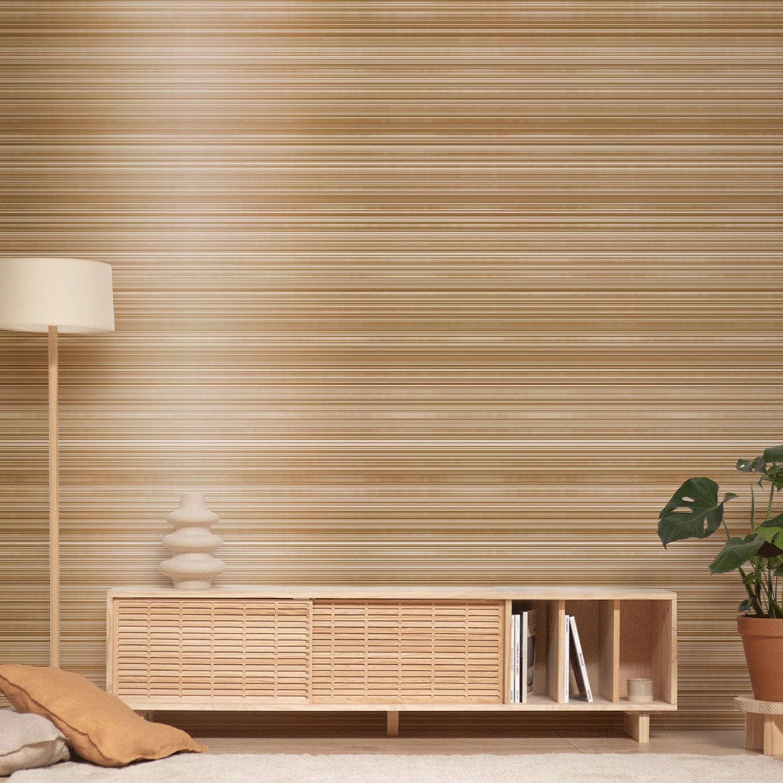Elegant metallic bronze striped textured wallpaper in modern living room, wood cabinet, floor lamp.