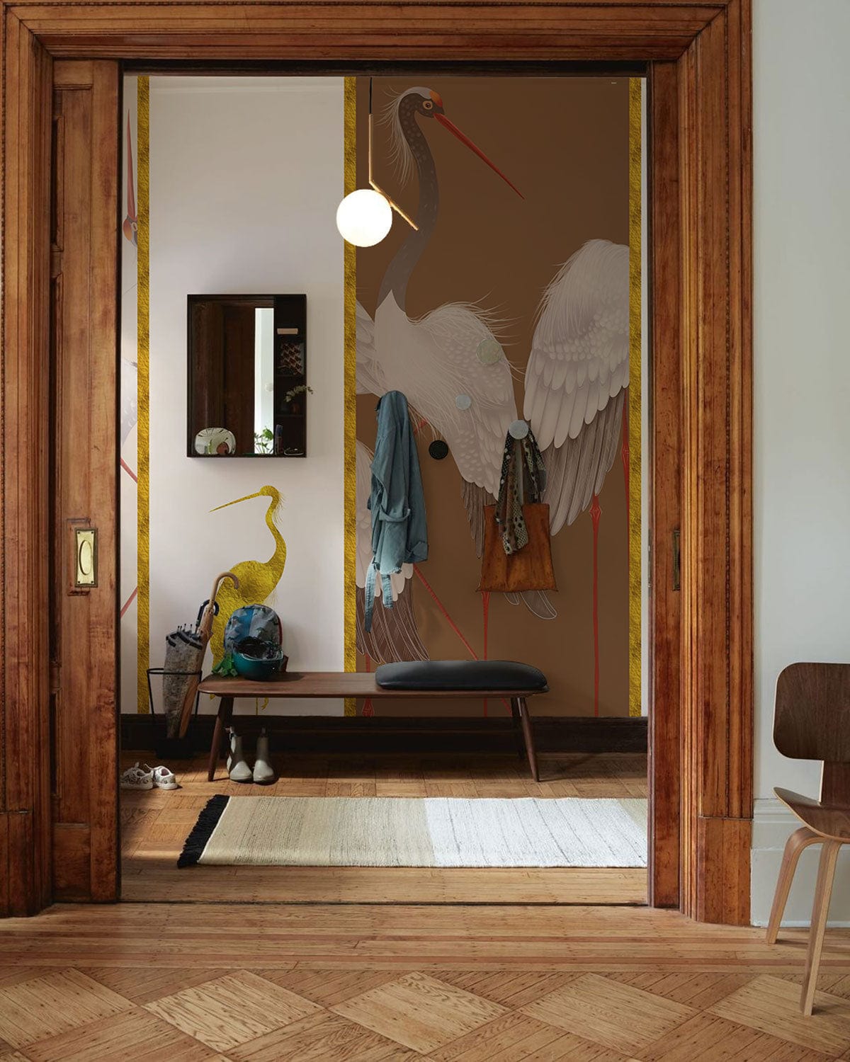 Elegant Crane Design Mural Wallpaper in neutral tones, wooden floor, hallway bench, modern light fixture.