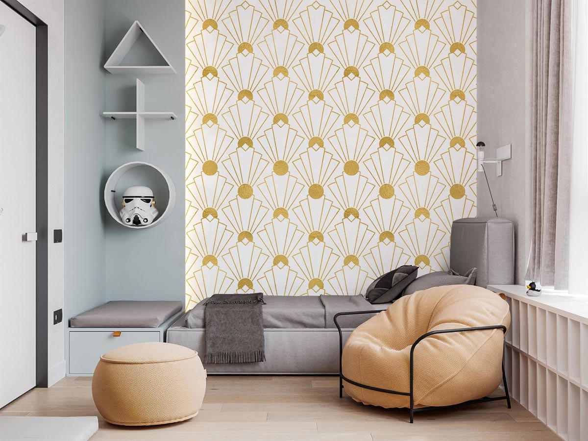 Elegant gold art deco fan wallpaper, grey sofa, beige pouffe, modern living room styling, wooden flooring.