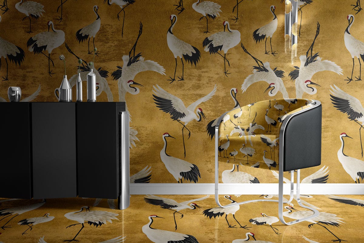Elegant Golden Crane Wallpaper in vintage Oriental pattern, featuring a chic chair and sleek black cabinet.