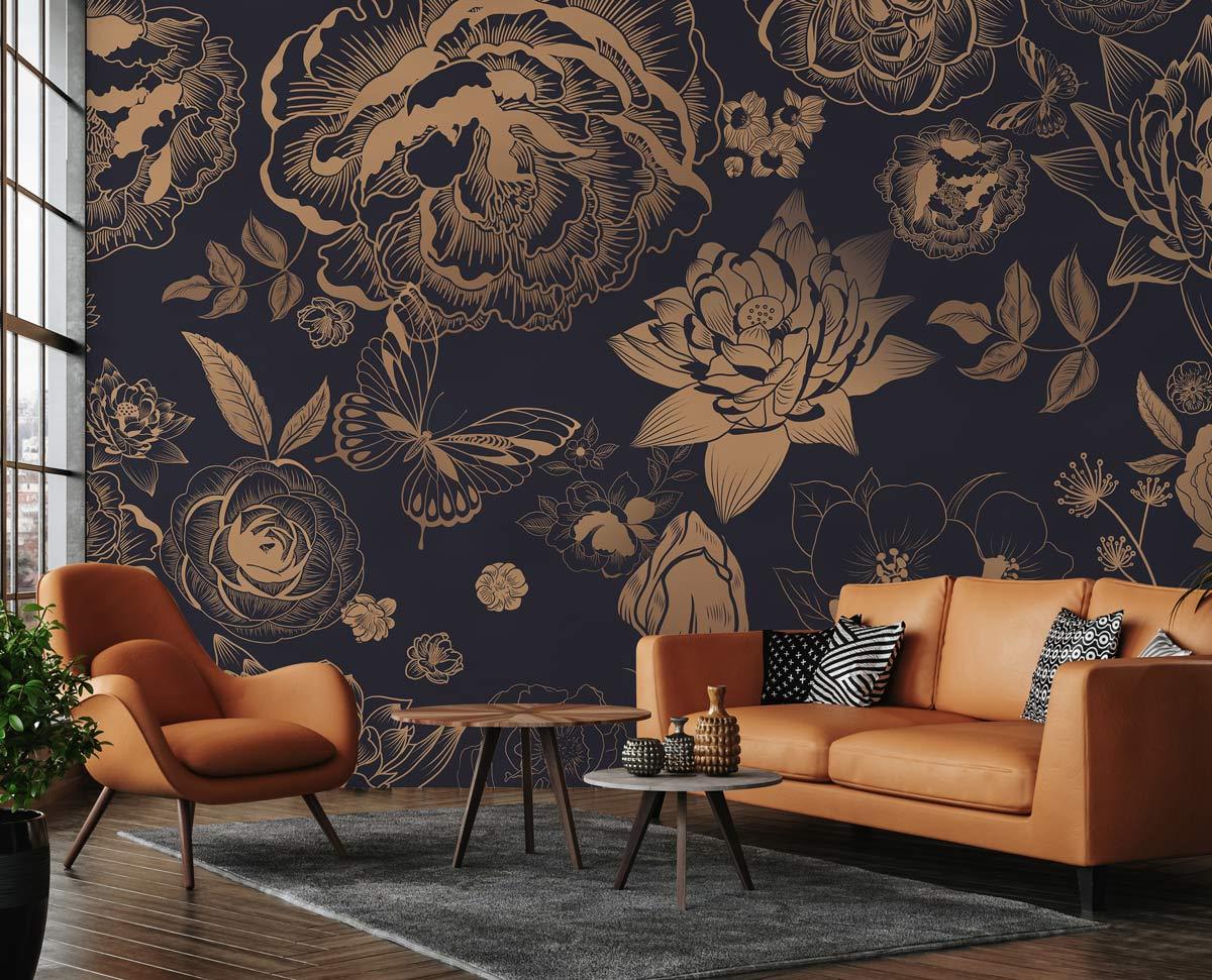 Luxurious gold floral damask wallpaper in living room with navy background, brown sofa, and modern decor.