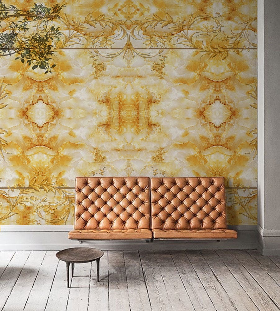Golden Baroque Ornate Mural Wallpaper, luxurious vintage design with tufted tan sofa, wooden flooring.