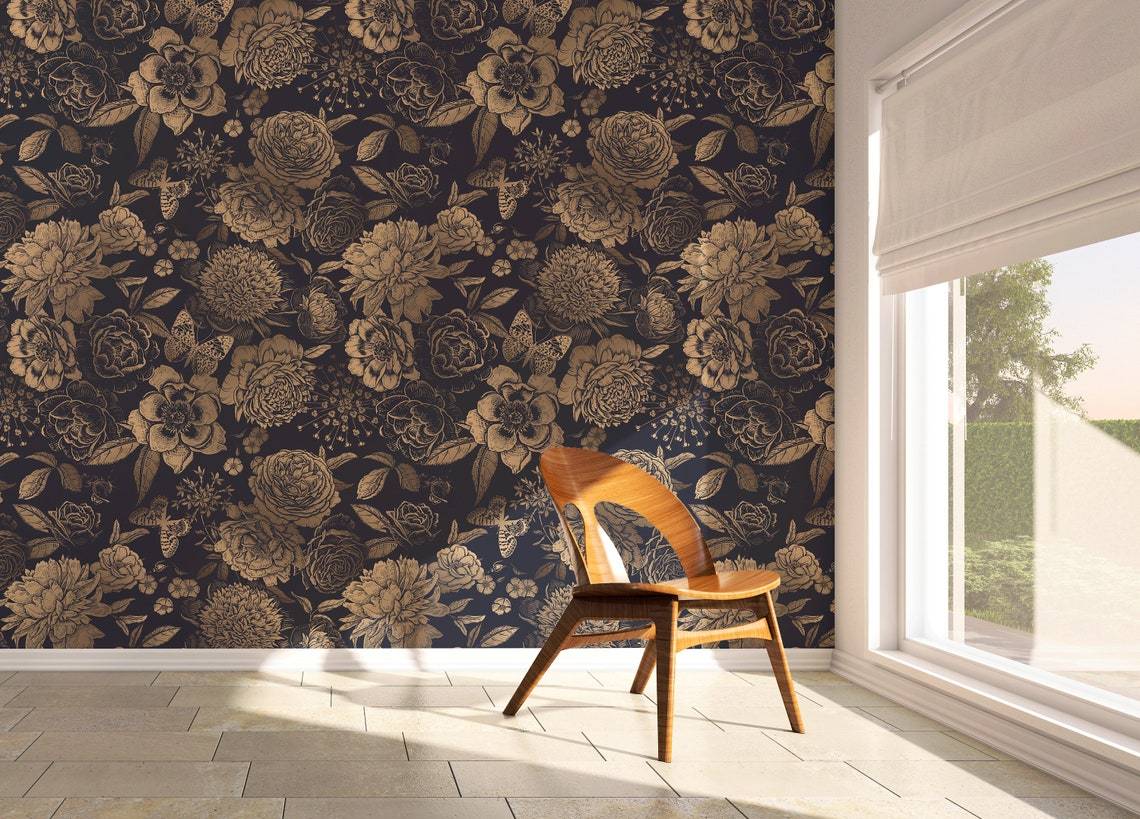 Luxurious gold floral damask wallpaper, elegant navy background, wooden chair, stone-tiled flooring.