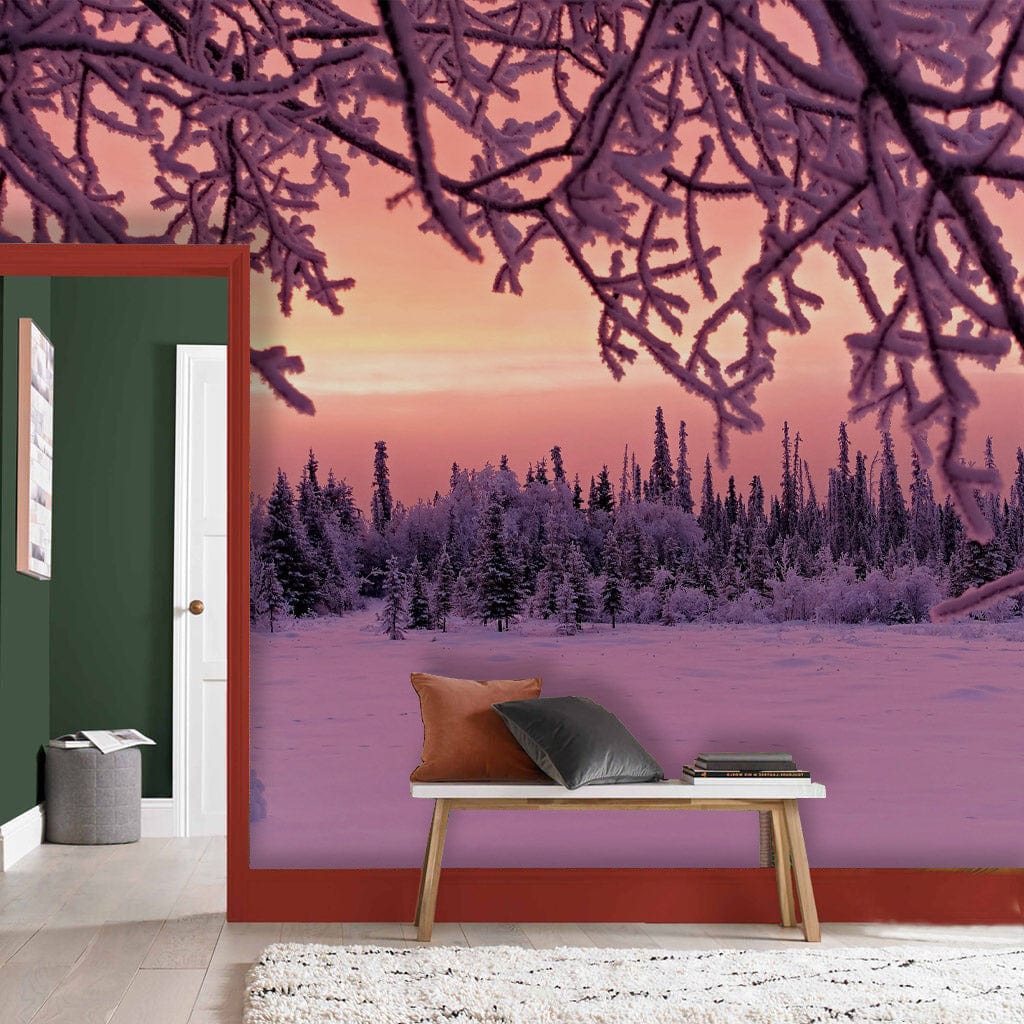 Elegant Frosted Winter Scene Purple-Pink Wallpaper Mural in room with green walls, grey sofa, wooden flooring.