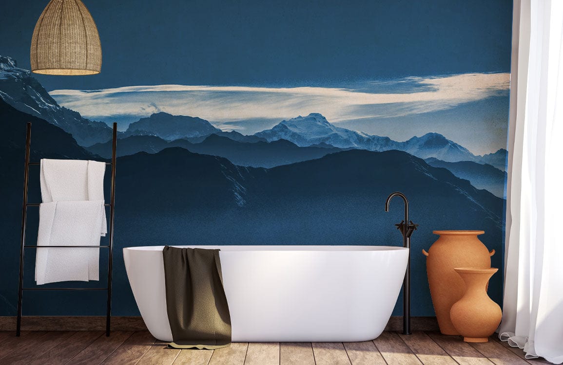 Elegant bathroom with Serene Twilight Blue Mountain Range Mural, freestanding bathtub, wooden floor, orange vases.
