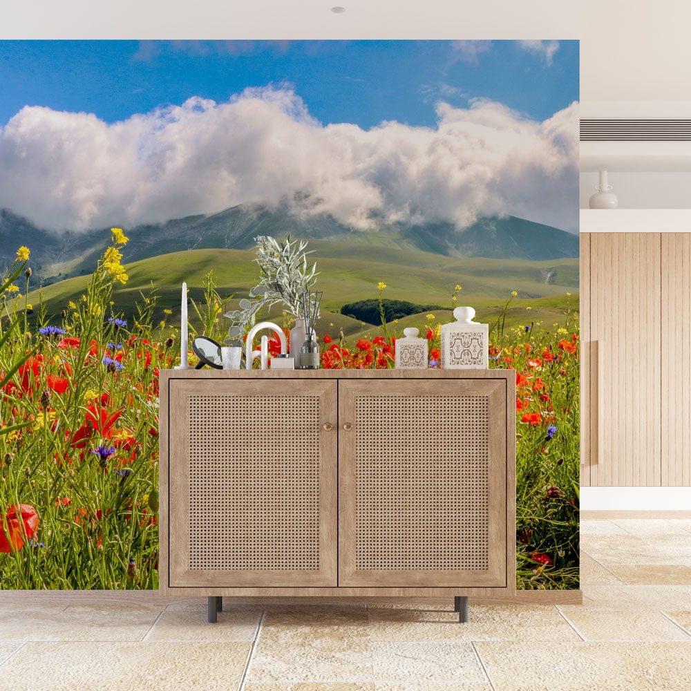 Vibrant Countryside Mural Wallpaper featuring red and green blossom design; wooden cabinet, tiled flooring.
