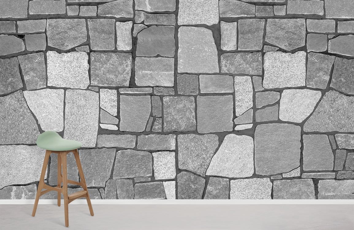 Grey stone brick rustic wall mural wallpaper with wooden stool in minimalistic room decor.