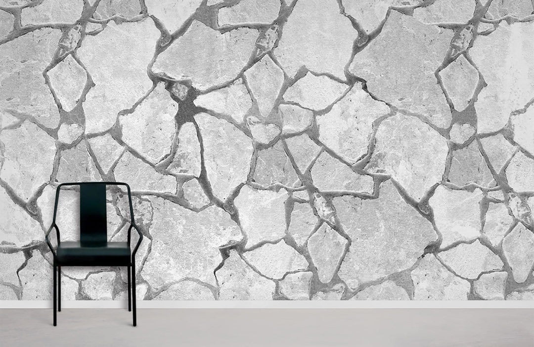 Rustic grey stone effect textured wallpaper with black chair; perfect for modern interiors, laminate flooring.