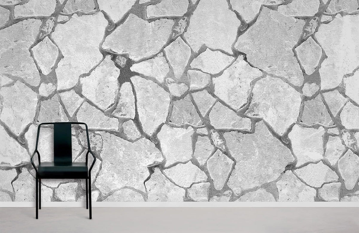 Rustic grey stone effect textured wallpaper with black chair; perfect for modern interiors, laminate flooring.