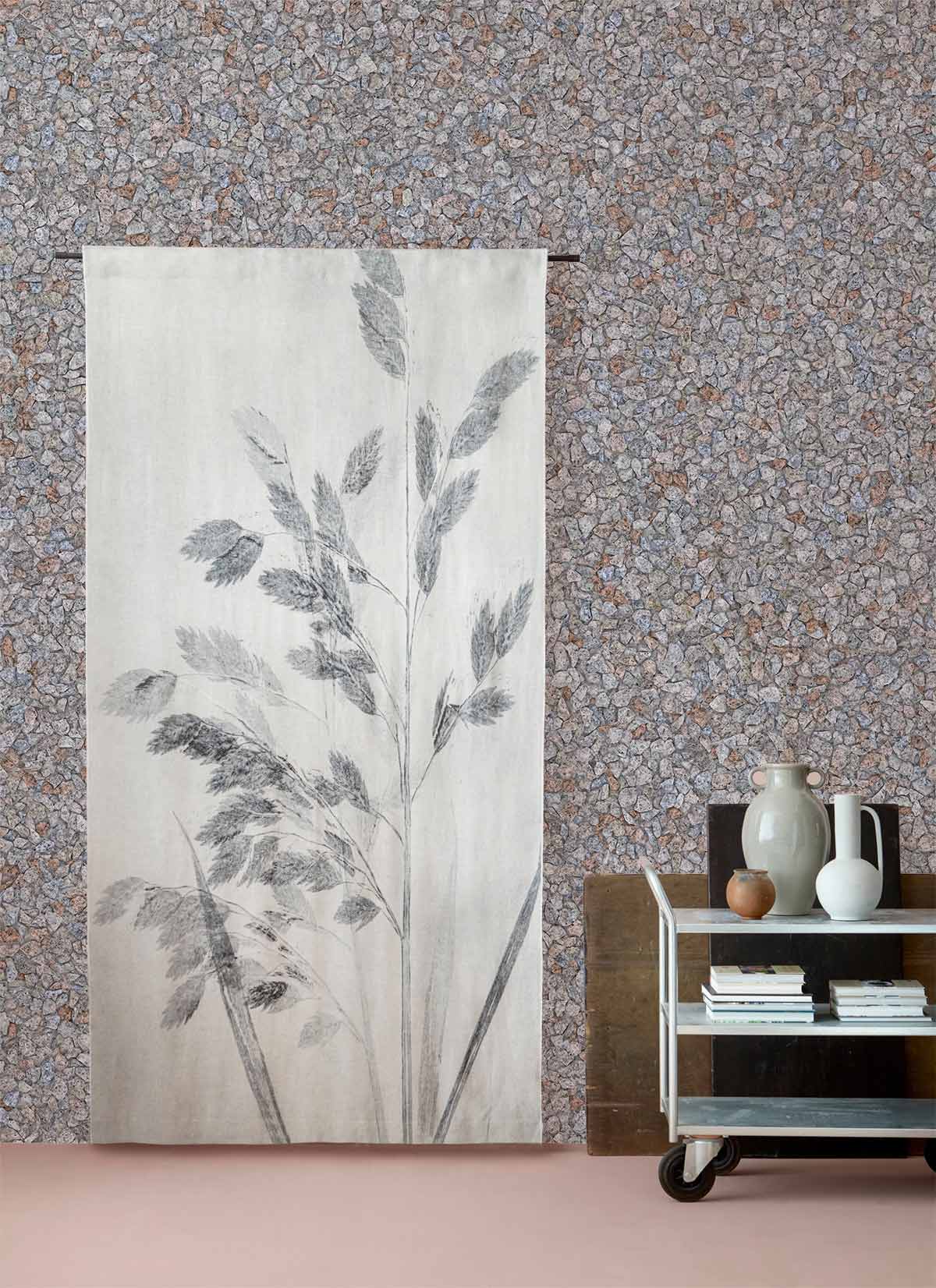 Textured grey granite stone effect wallpaper in modern room with soft pink flooring and stylish decor.