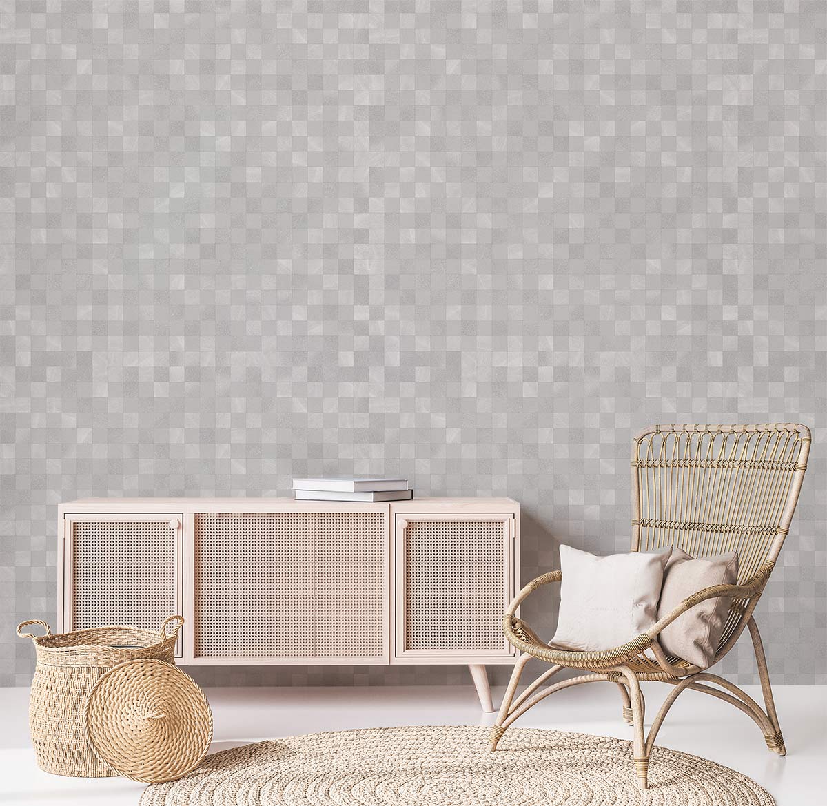 Modern grey geometric pixel wallpaper with rattan chair, light wood sideboard, and textured rug in living room.
