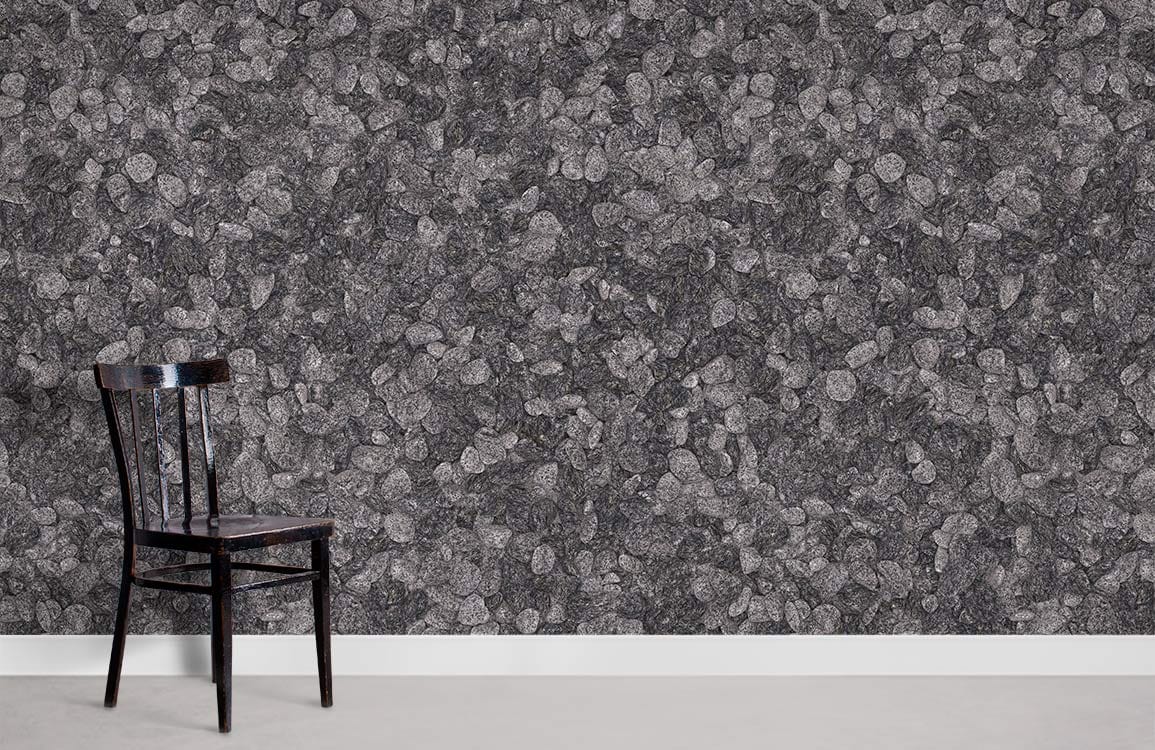 Elegant grey pebble textured wallpaper with dark wooden chair in minimalist room setting.