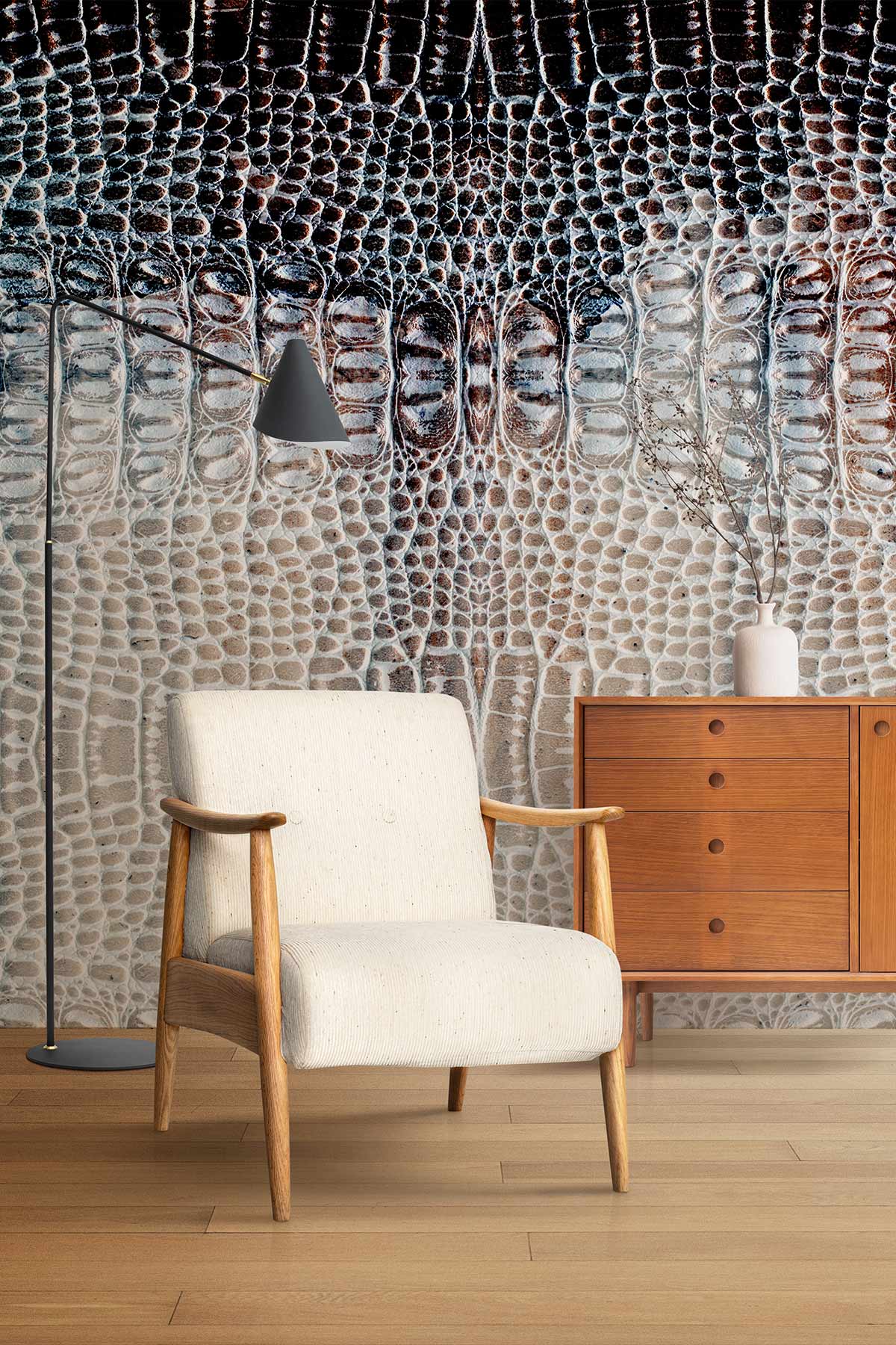 Elegant grey crocodile skin pattern wallpaper with cream armchair, wooden sideboard, and modern floor lamp.