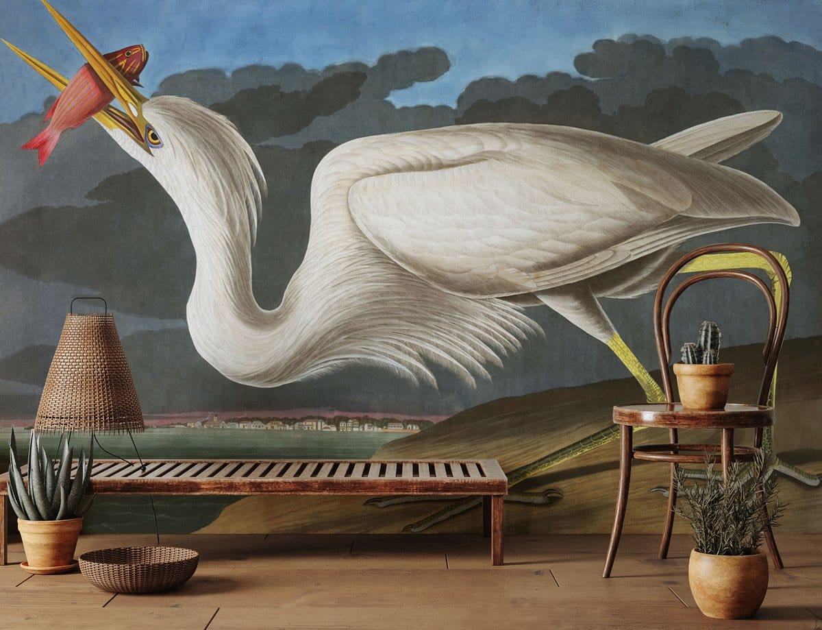 Elegant Heron vintage mural wallpaper with wooden bench, chair, and stylish decor in a cosy room.