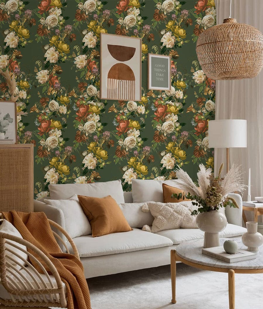 Vintage floral green wallpaper complements a cosy living room; beige sofa and wicker pendant light.