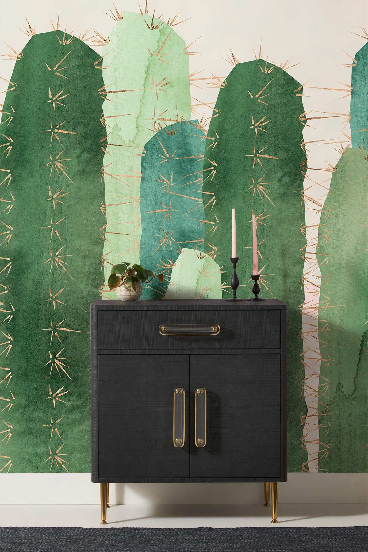 Stylish green cactus mural wallpaper accentuates a modern charcoal sideboard in a contemporary interior.