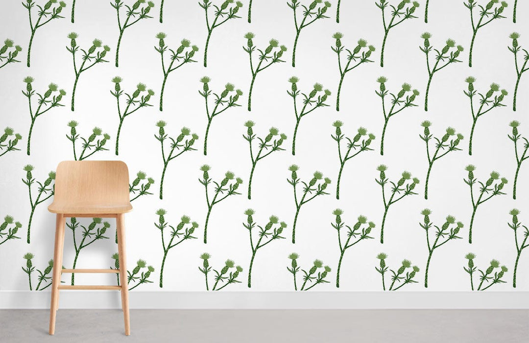 Elegant green botanical floral wallpaper in modern interior with wooden chair and grey flooring.