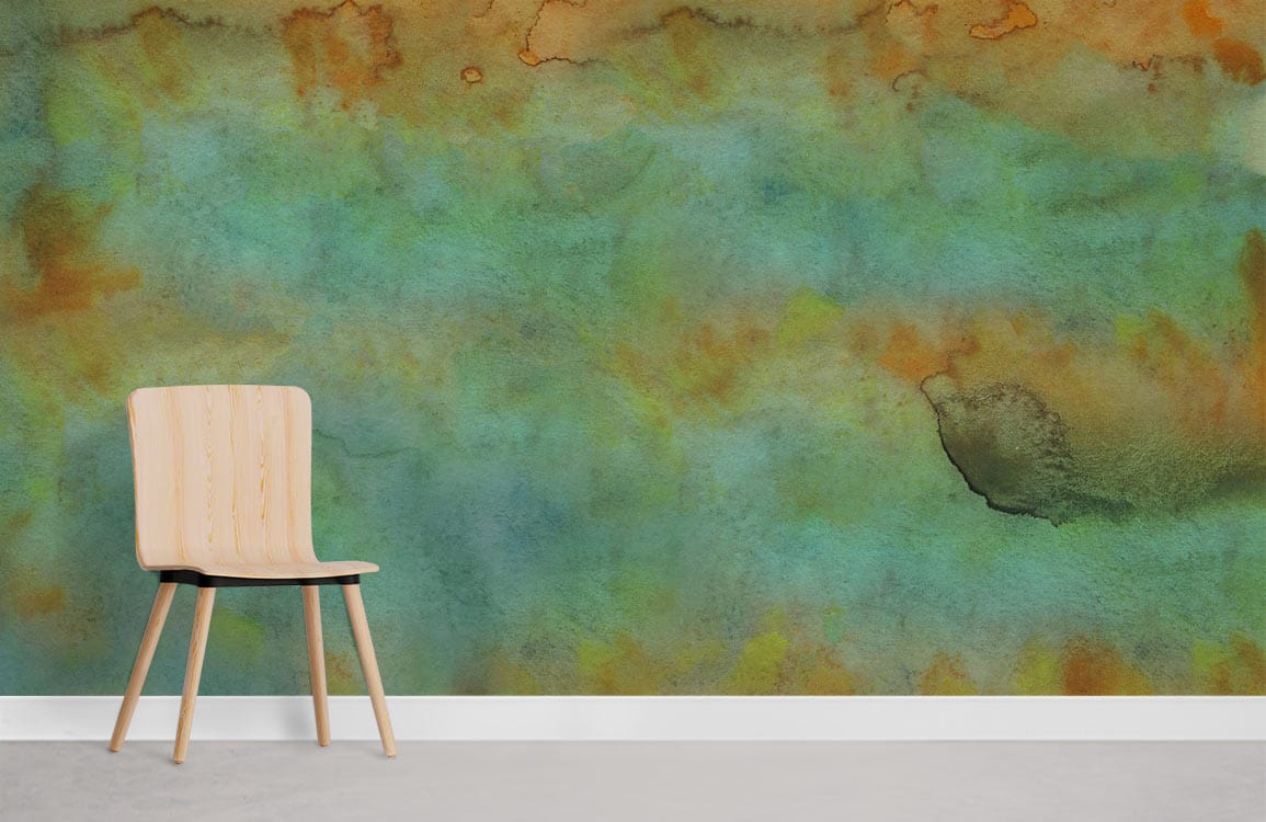 Abstract watercolour art mural wallpaper in earthy green and orange, wooden chair, grey flooring.
