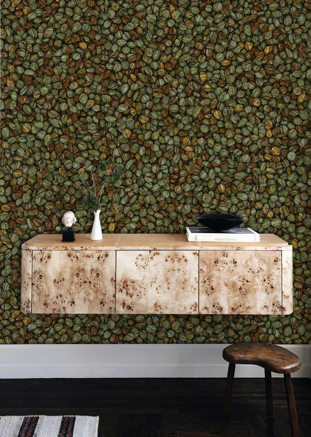 Earthy Tones Leaf Pattern Wallpaper featuring natural green brown design with beige wood cabinet and stool.