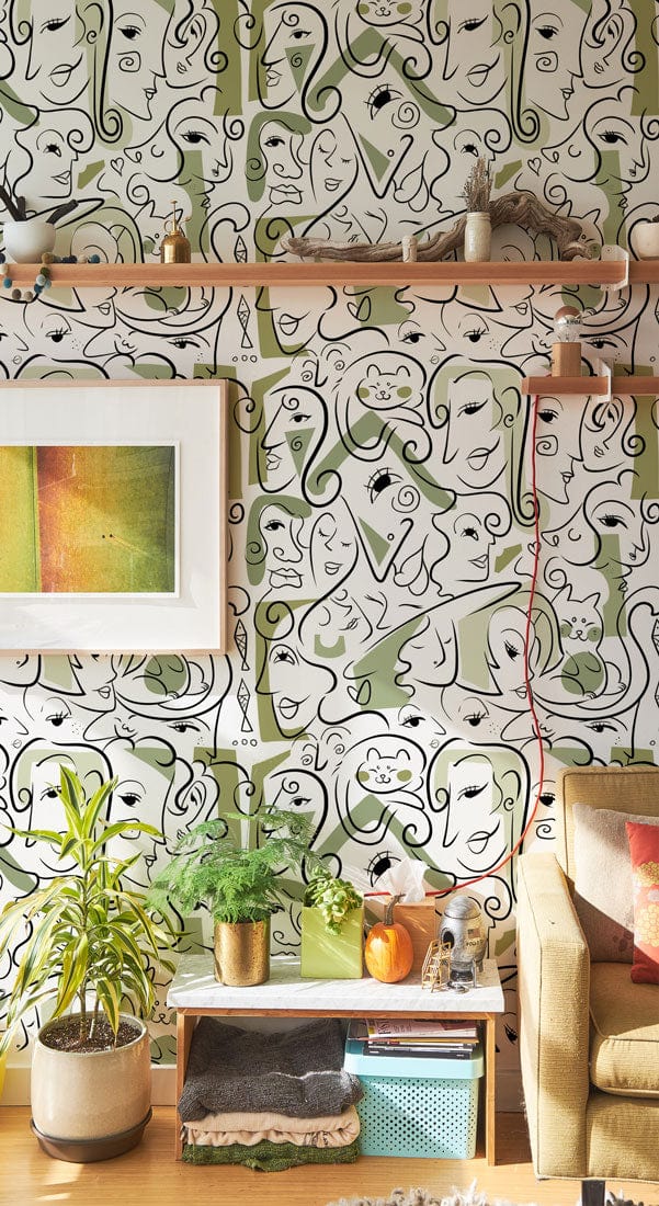Abstract green and white line art wallpaper in modern room, beige sofa, wooden flooring.