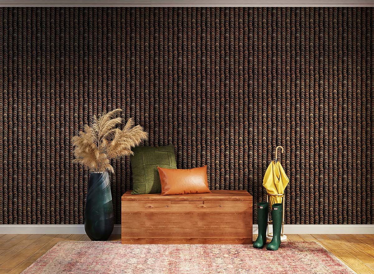 Stylish chevron wallpaper with wooden bench, green cushion, and pink rug in a chic interior setting.