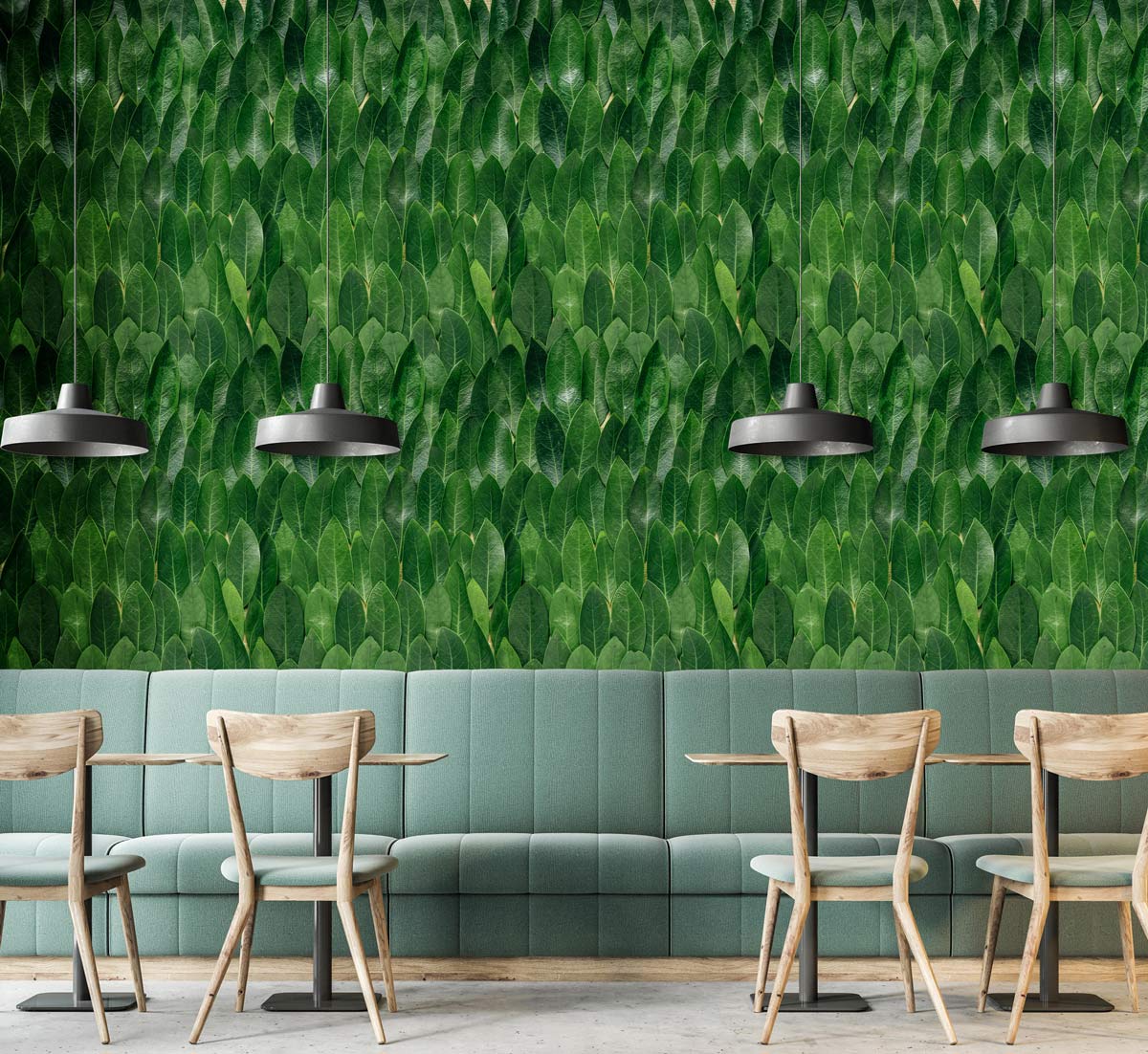 Green botanical wallpaper, Verdant Leafy Escape, dining room with teal sofa, wooden chairs, and pendant lights.