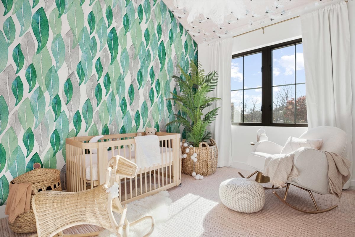 Elegant wallpaper with green leaf pattern in modern nursery; light furniture, soft furnishing accents.