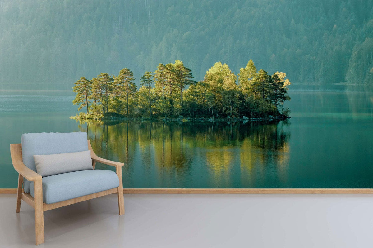Idyllic mural of forest island lake with blue armchair, wood flooring, serene living room scene.