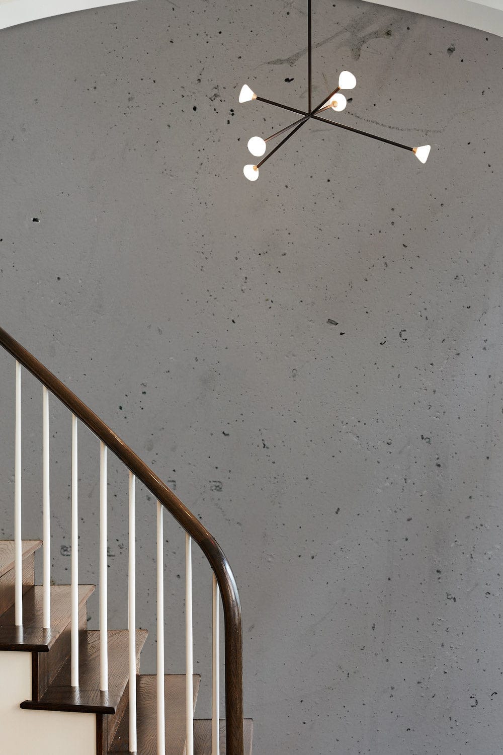 Vintage Slate Grey Concrete Wallpaper, modern staircase, contemporary lighting, wall texture, minimalist interior design.