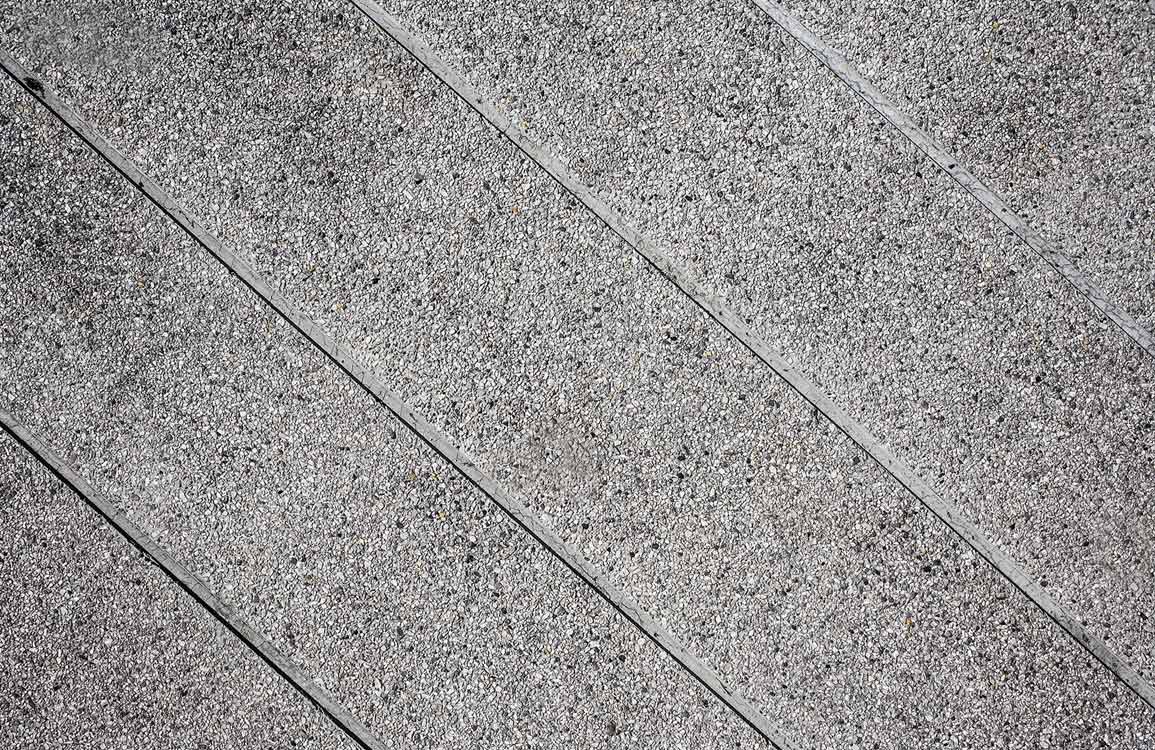 Modern Grey Diagonal Concrete Texture Wallpaper for Industrial Chic Spaces