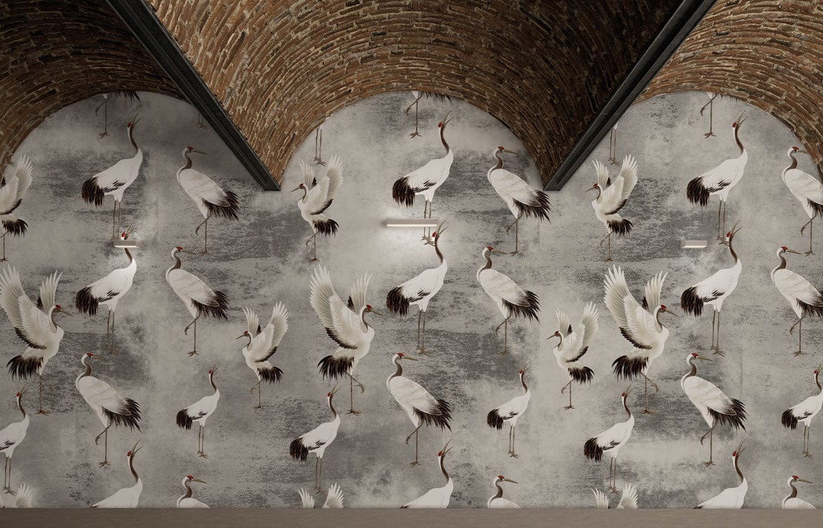 Graceful Crane Dance wallpaper in arched brick room, elegant grey tones complement industrial style.