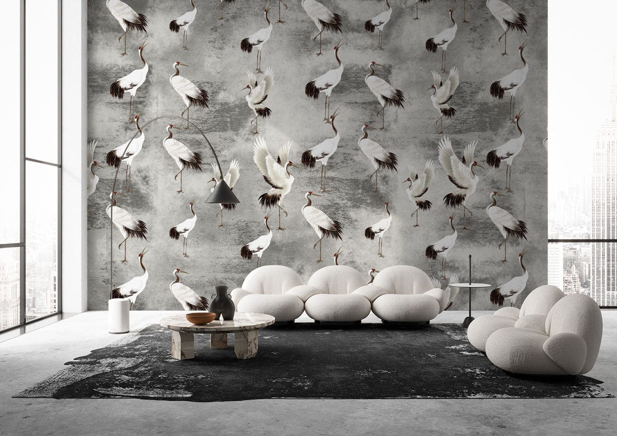 Elegant nature-inspired wallpaper with cranes, white modern sofas, dark rug, concrete floor in spacious living room.