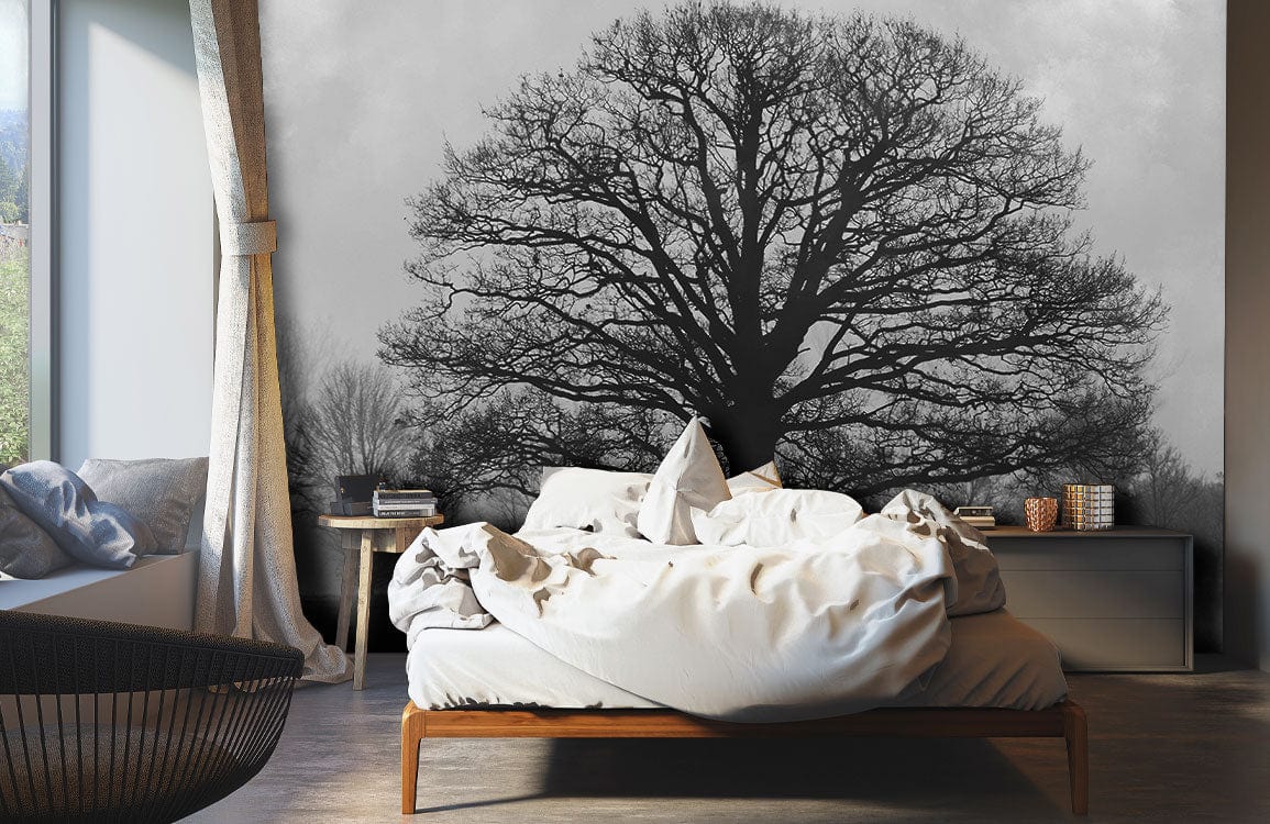 Majestic Black Oak Tree wallpaper, misty monochrome landscape, contemporary bedroom setting with grey tones.