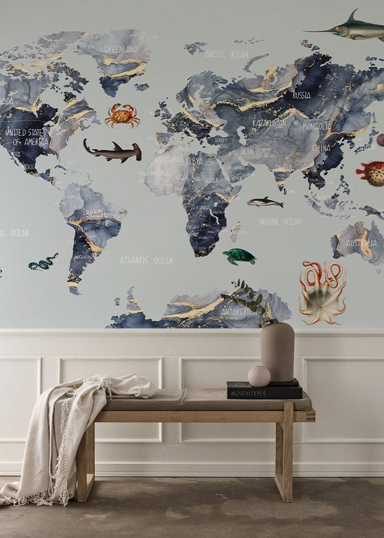 Nautical World Map Mural: Oceanic Animals on Blue-Grey Wallpaper, wooden bench in stylish room.