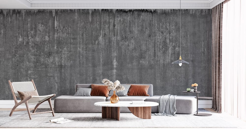 Industrial Chic grey concrete textured mural wallpaper with grey sofa, modern lighting, and neutral decor.