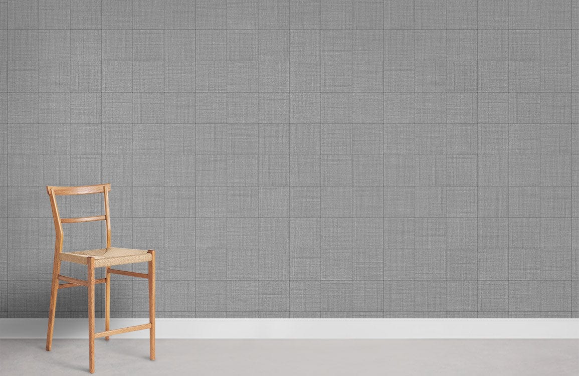 Contemporary grey textured linen pattern wallpaper with wooden chair on light grey flooring in modern room.