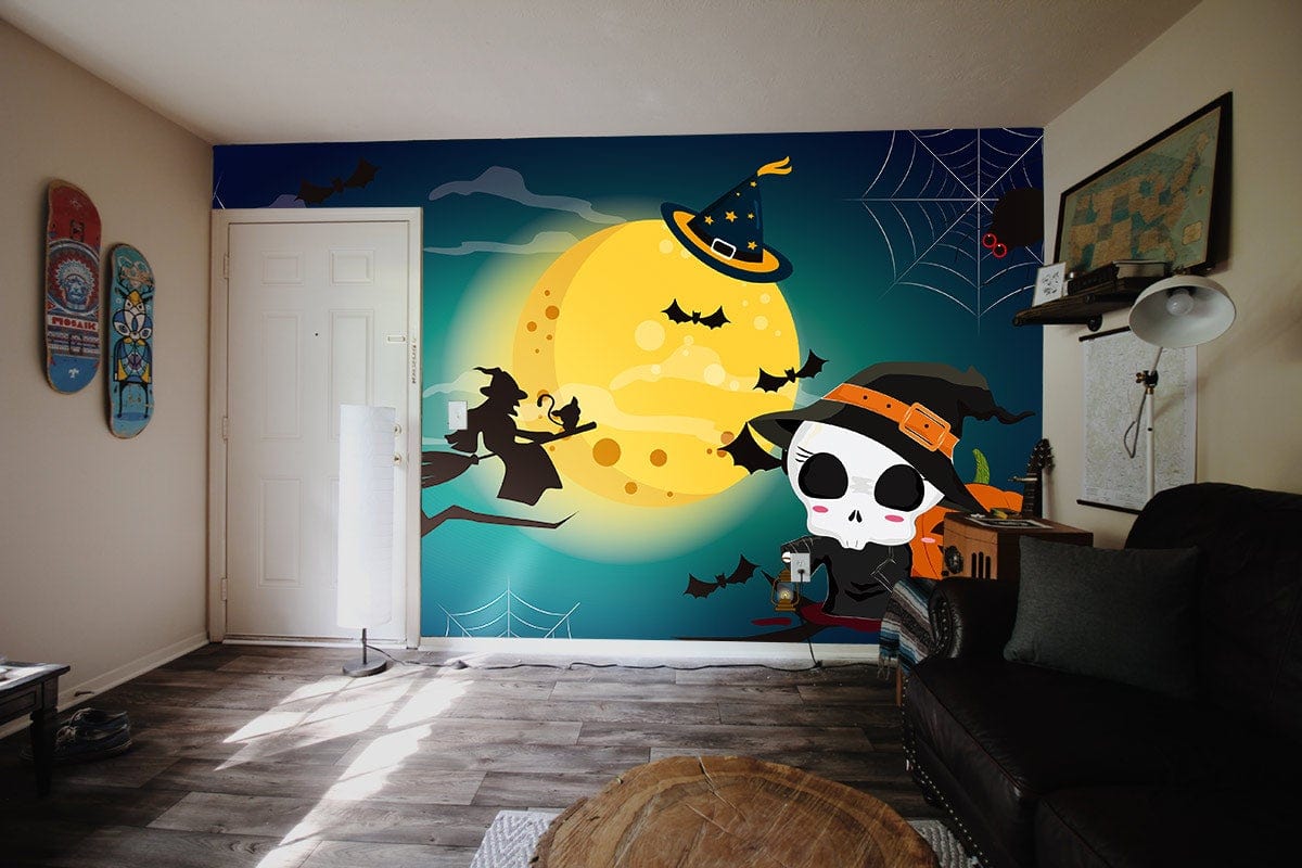 Spooky Halloween mural wallpaper with dark witch, moonlit bats, black sofa, wooden flooring, cosy living room.